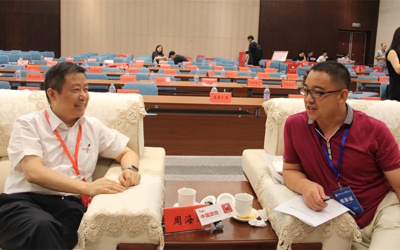 红豆为什么赢？看周氏三代从手工作坊到国际布局